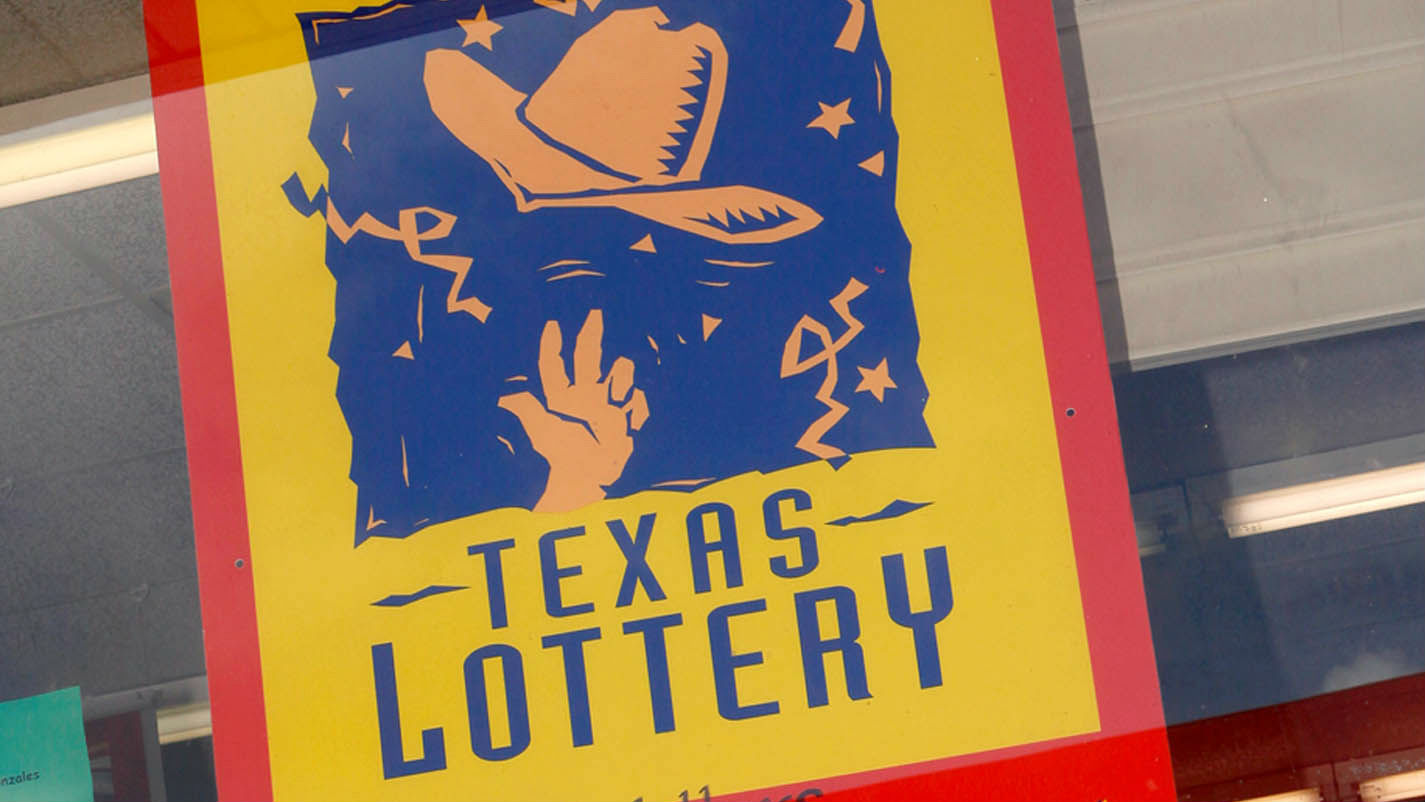 FILE - In this July 9, 2010 file photo, a poster advertising the Texas Lottery is on display at the Times Market in Bishop, Texas. (AP Photo/Steve Nurenberg, File)