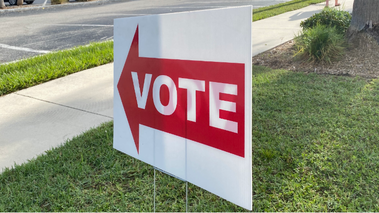 A sign points to a voting location in this file image. (Spectrum News 1/FILE)
