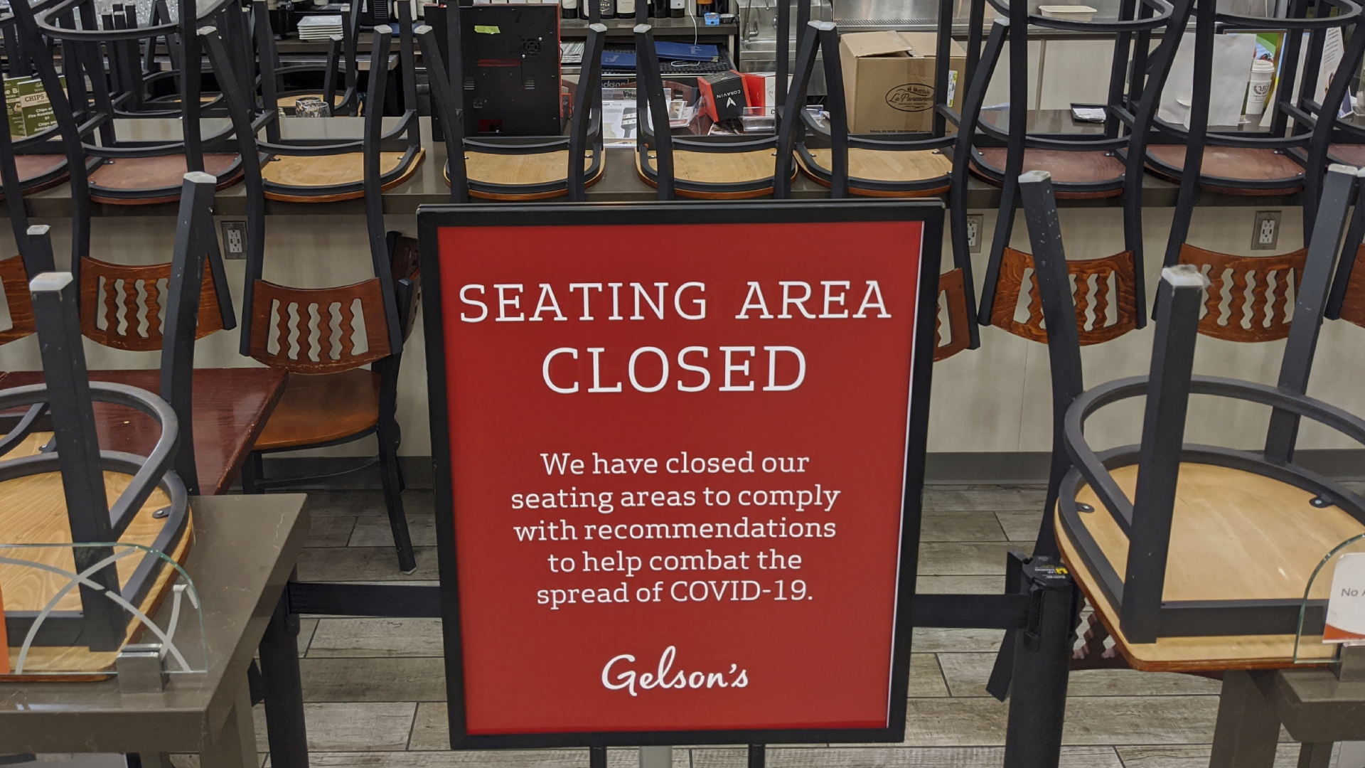 FILE - In this March 26, 2020, file photo, an indoors sitting bar is closed inside the Gelson's Market in the Los Feliz neighborhood of Los Angeles. (AP Photo/Damian Dovarganes, File)