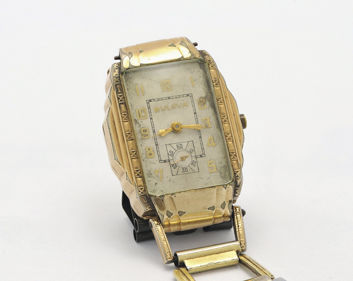 In this May 9, 2019, photo provided by RR Auction, a watch belonging to Clyde Barrow is shown. A book of poetry handwritten by Bonnie Parker and a watch belonging to Clyde Barrow are among items from the outlaw Texas couple being offered at auction. 