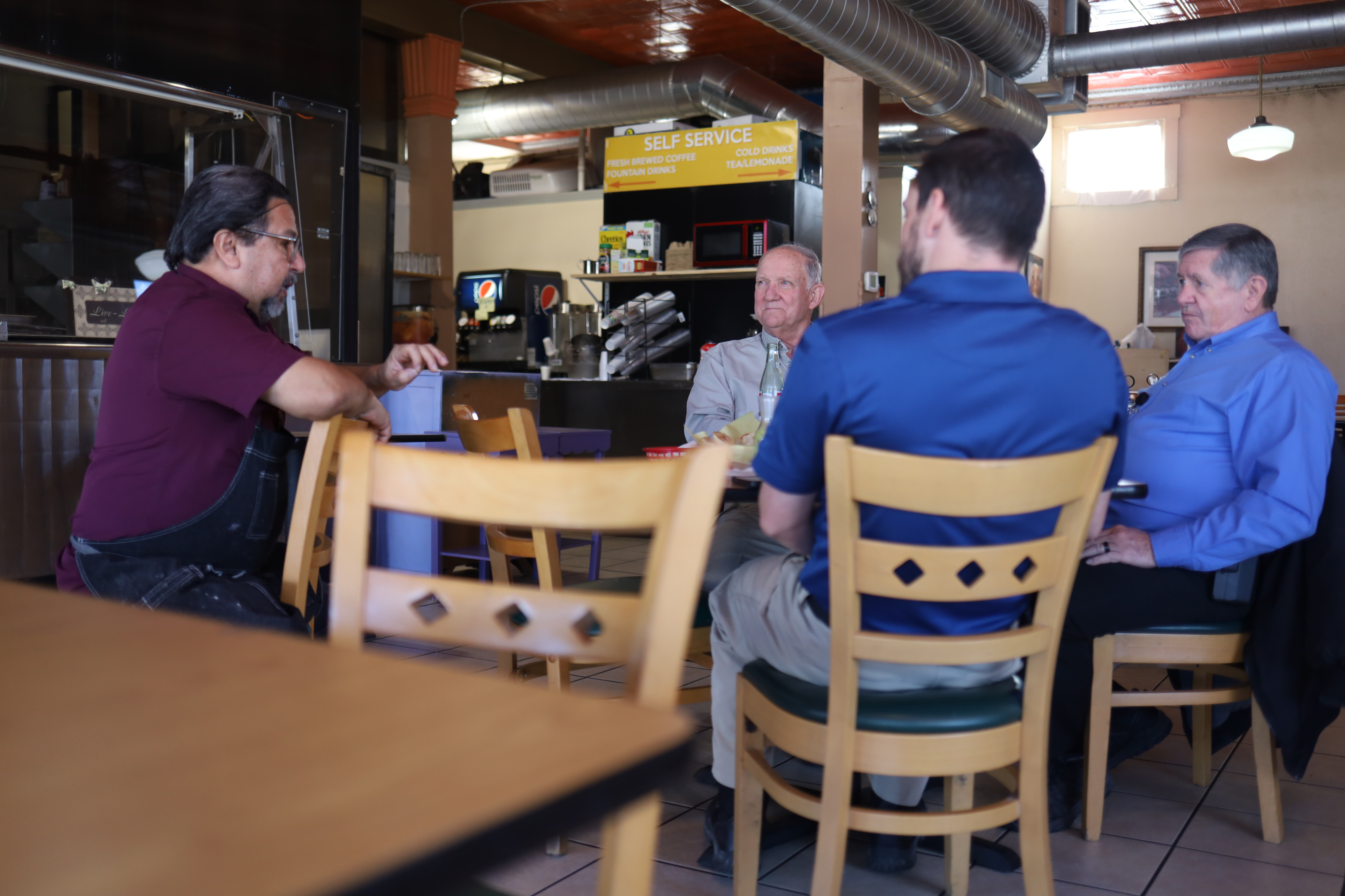 Sergio Calderon chats with his customers at his restaurant, Panchos and Gringos. (Spectrum News 1/Jose Arredondo)