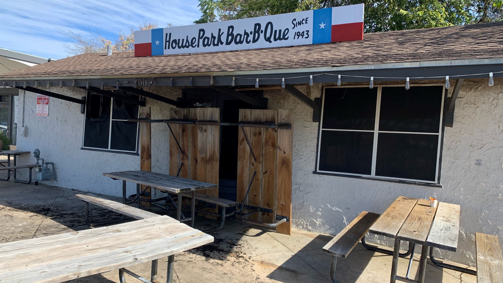 An entrance to House Park Bar-B-Que in Austin, Texas, is boarded up in this image from December 1, 2020. (John Pope/Spectrum News 1)
